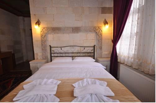 Imagen de la habitación del Cappadocia Stone Palace. Foto 5