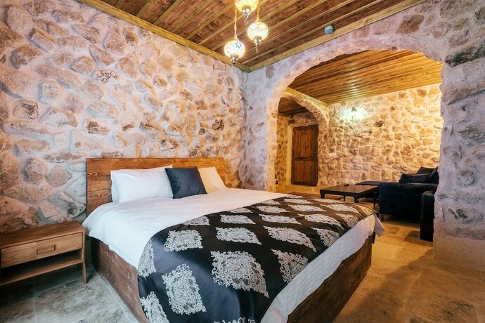 Imagen de la habitación del Cappadocia Tuğhan Stone House. Foto 12