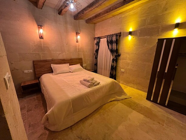 Imagen de la habitación del Cappadocia Tuğhan Stone House. Foto 13