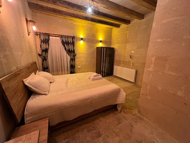 Imagen de la habitación del Cappadocia Tuğhan Stone House. Foto 14