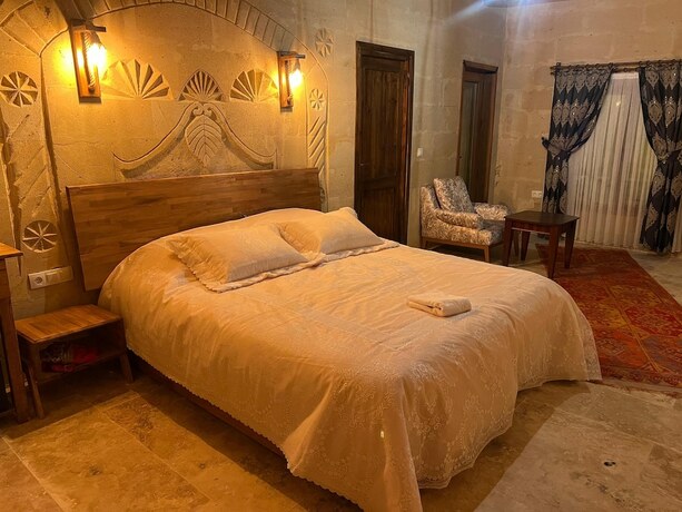 Imagen de la habitación del Cappadocia Tuğhan Stone House. Foto 17