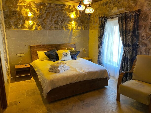Imagen de la habitación del Cappadocia Tuğhan Stone House. Foto 19