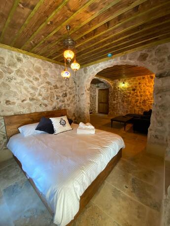 Imagen de la habitación del Cappadocia Tuğhan Stone House. Foto 20