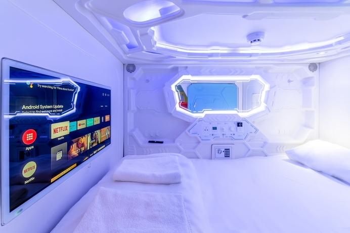 Imagen de la habitación del Capsule Inn. Foto 1