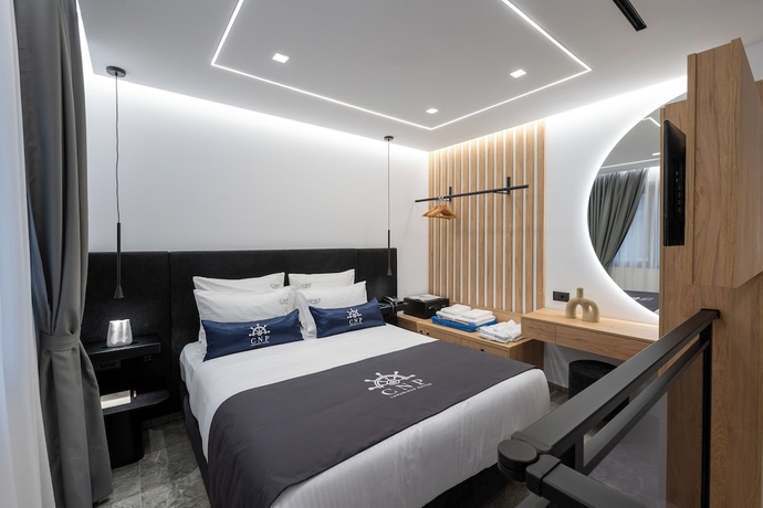 Imagen de la habitación del Captain Napoleon Paterakis CNP Luxurious Suites. Foto 10