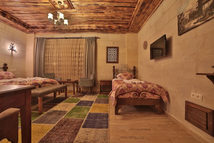 Imagen de la habitación del Caravanserai Inn Hotel. Foto 8