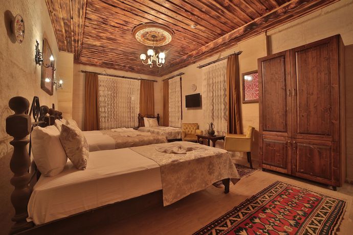 Imagen de la habitación del Caravanserai Inn Hotel. Foto 13