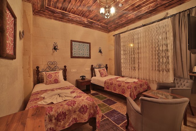 Imagen de la habitación del Caravanserai Inn Hotel. Foto 14