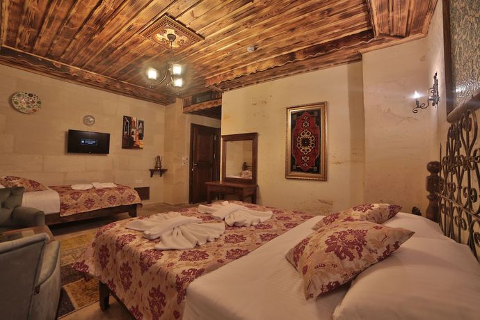 Imagen de la habitación del Caravanserai Inn Hotel. Foto 15