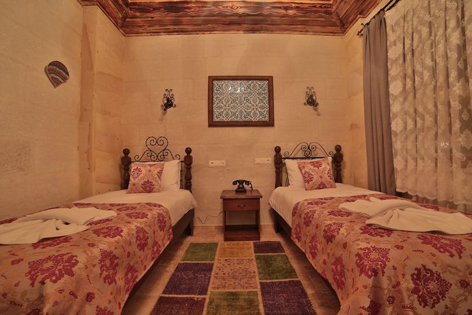 Imagen de la habitación del Caravanserai Inn Hotel. Foto 17