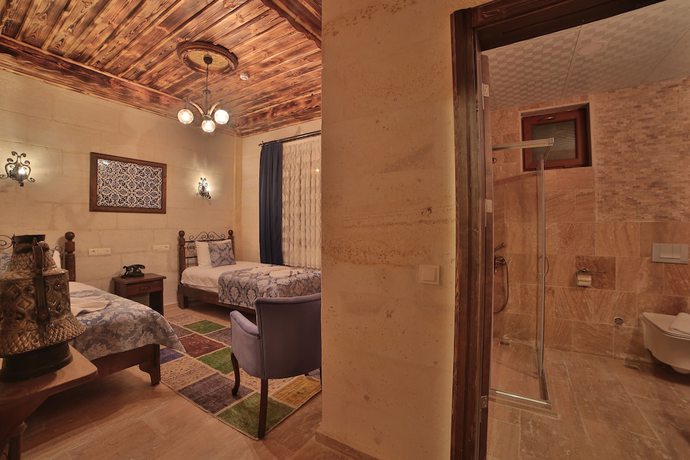 Imagen de la habitación del Caravanserai Inn Hotel. Foto 19