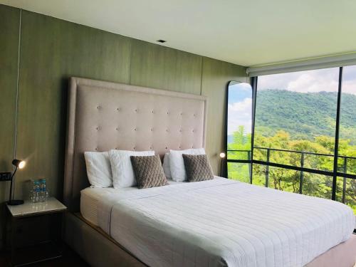 Imagen de la habitación del Cardedeu Hotel Lago de Coatepeque. Foto 18