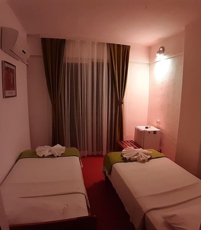 Imagen de la habitación del Caretta Caretta Hotel. Foto 7