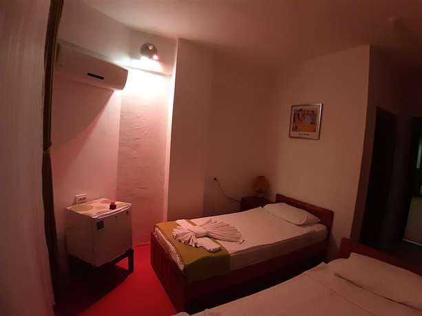 Imagen de la habitación del Caretta Caretta Hotel. Foto 10