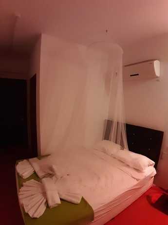 Imagen de la habitación del Caretta Caretta Hotel. Foto 11
