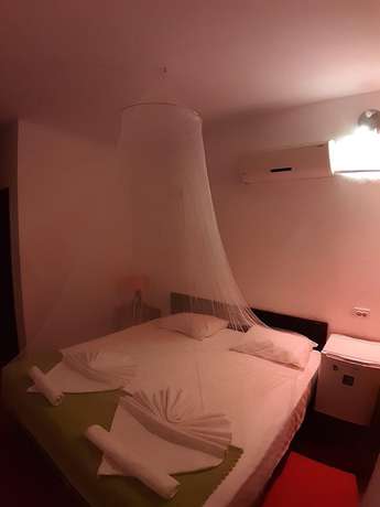 Imagen de la habitación del Caretta Caretta Hotel. Foto 12