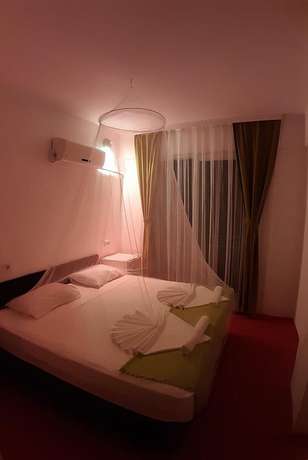 Imagen de la habitación del Caretta Caretta Hotel. Foto 13
