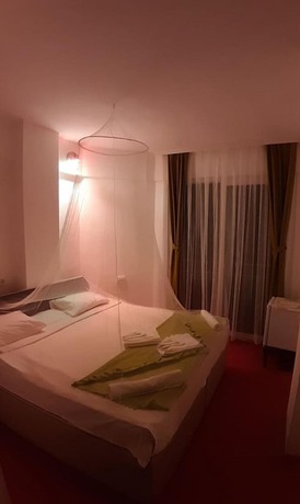 Imagen de la habitación del Caretta Caretta Hotel. Foto 15