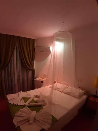 Imagen de la habitación del Caretta Caretta Hotel. Foto 16