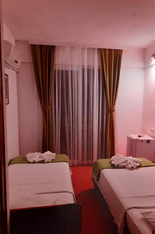 Imagen de la habitación del Caretta Caretta Hotel. Foto 17