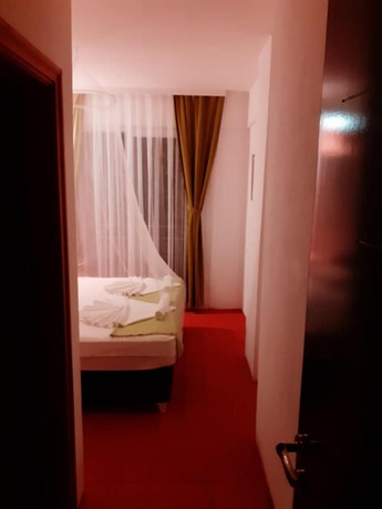 Imagen de la habitación del Caretta Caretta Hotel. Foto 18