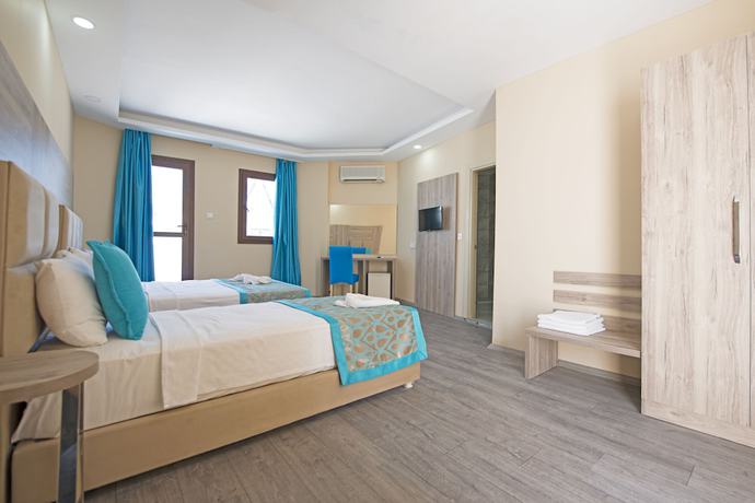 Imagen de la habitación del Carina Resort Hotel. Foto 11