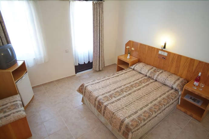 Imagen de la habitación del Carmina Hotel. Foto 9