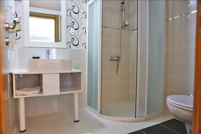 Imagen de la habitación del Carmina Hotel. Foto 12