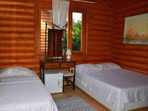 Imagen de la habitación del Carpe Diem Bungalow. Foto 18