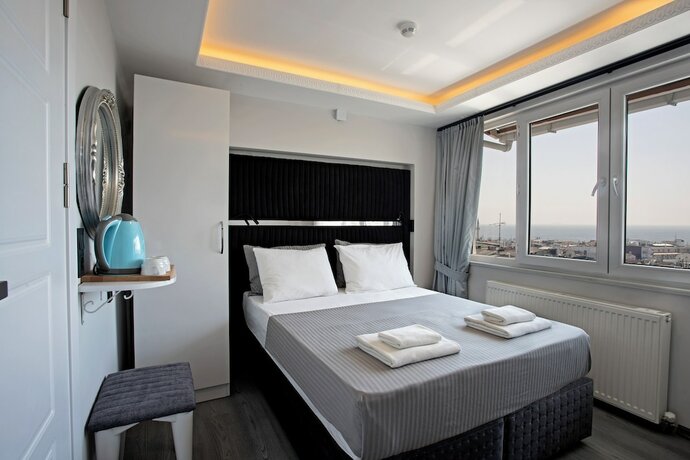 Imagen de la habitación del Carvan Hotel. Foto 20