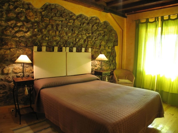 Imagen de la habitación del Casa Aldea el Jard&iacute;n. Foto 3