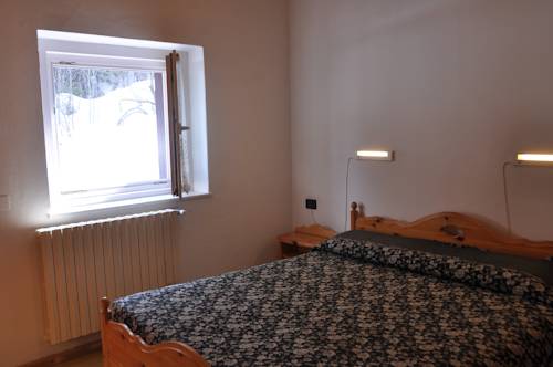 Imagen de la habitación del Casa Alpina Dobbiaco. Foto 3