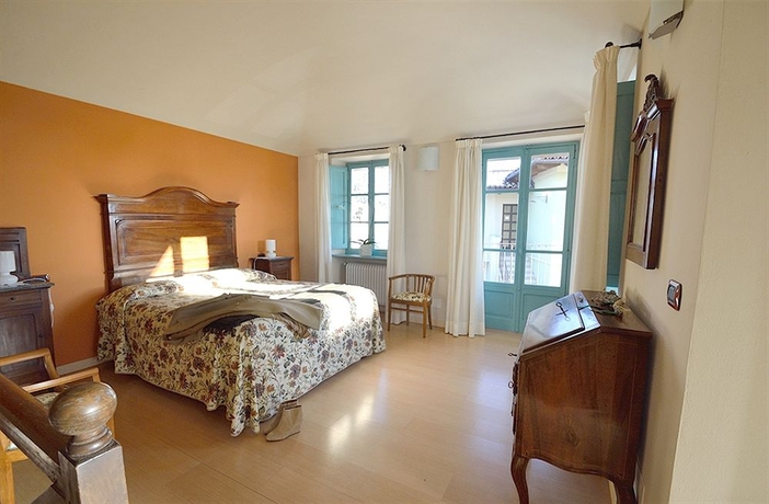 Imagen de la habitación del Casa Brina Suites. Foto 3