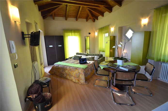 Imagen de la habitación del Casa Brina Suites. Foto 5