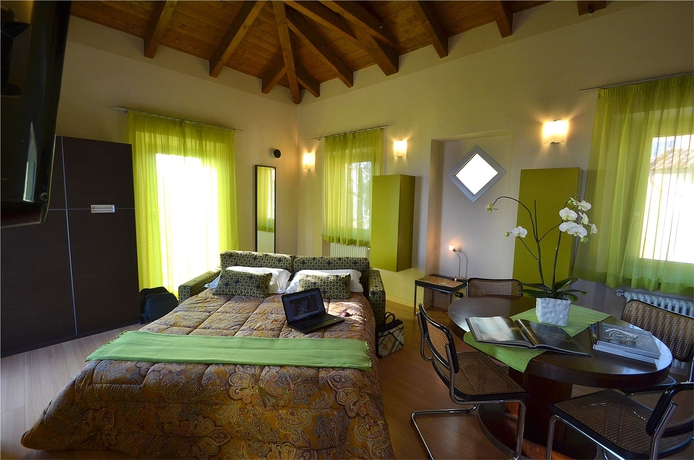 Imagen de la habitación del Casa Brina Suites. Foto 6