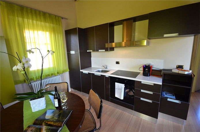 Imagen de la habitación del Casa Brina Suites. Foto 7