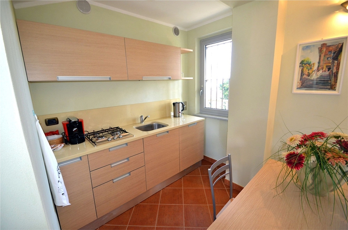 Imagen de la habitación del Casa Brina Suites. Foto 9