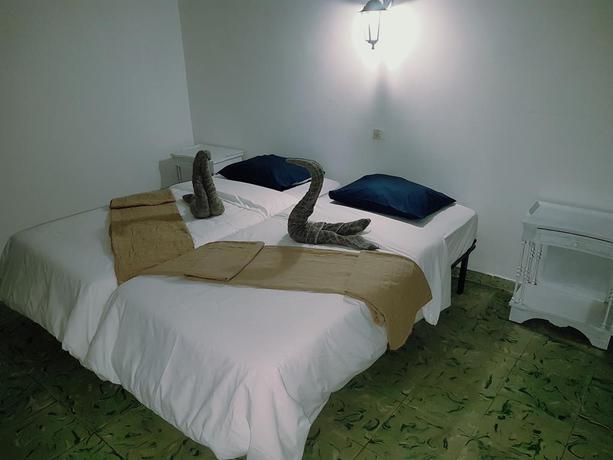 Imagen de la habitación del Casa De Hu&eacute;spedes La Marina. Foto 10