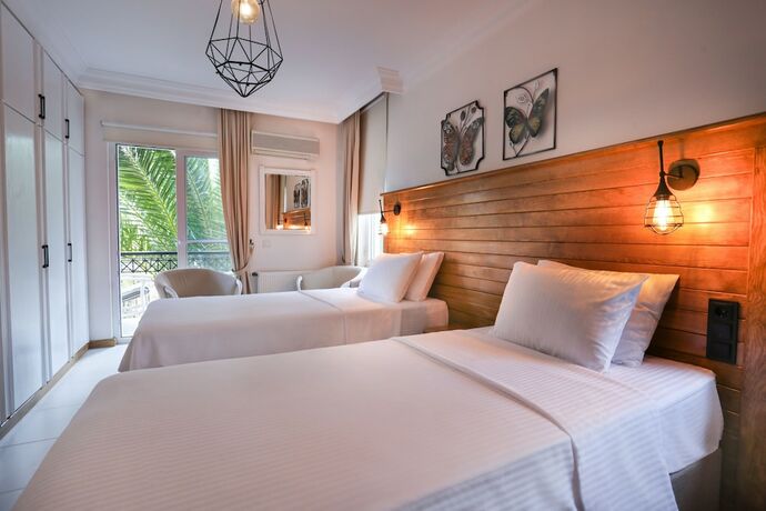 Imagen de la habitación del Casa Linn Boutique Hotel. Foto 14