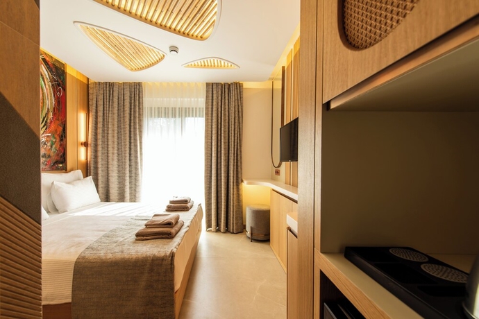 Imagen de la habitación del Casa Mimas Hotel. Foto 2
