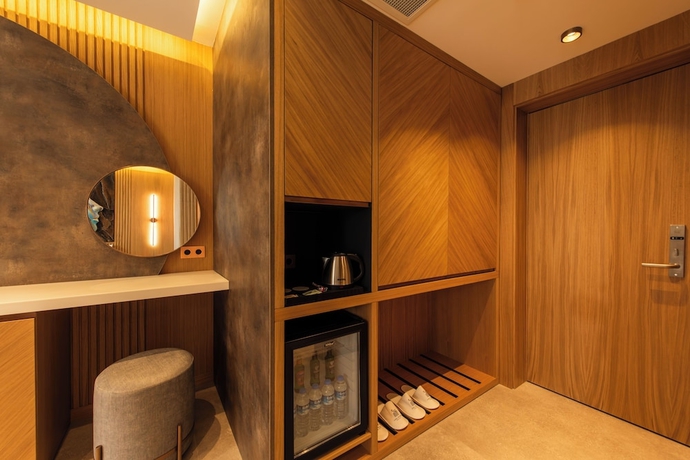 Imagen de la habitación del Casa Mimas Hotel. Foto 10