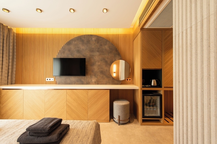 Imagen de la habitación del Casa Mimas Hotel. Foto 16