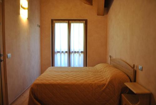 Imagen de la habitación del Casa Vacanza La Rocca. Foto 7