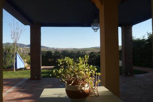 Imagen de los exteriores del Casa de Las Flores, Alhendín. Foto 8