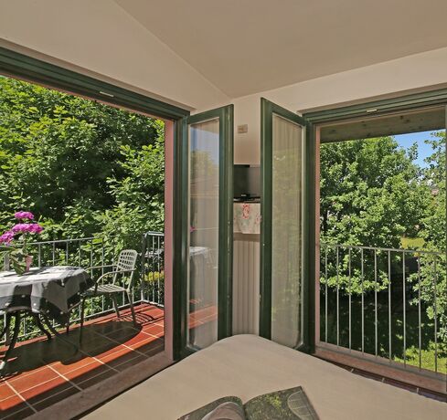 Imagen de la habitación del Casa per Ferie Garda Il Melograno. Foto 15