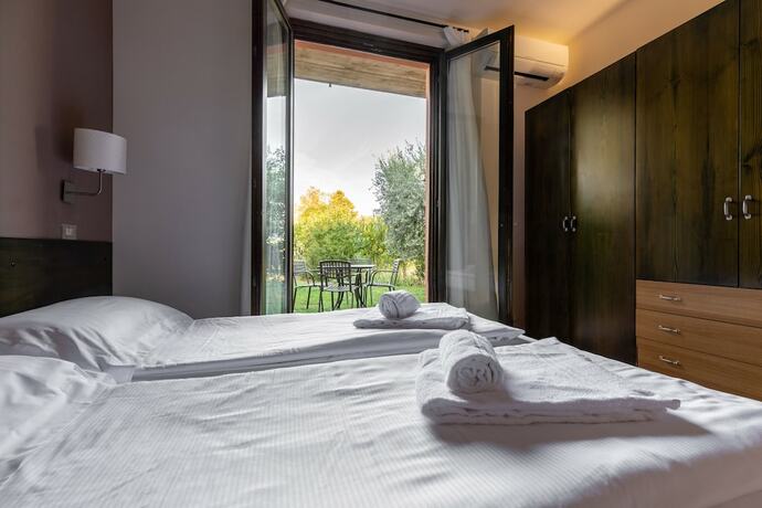 Imagen de la habitación del Casa per Ferie Garda Il Melograno. Foto 16