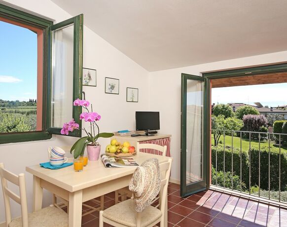 Imagen de la habitación del Casa per Ferie Garda Il Melograno. Foto 17