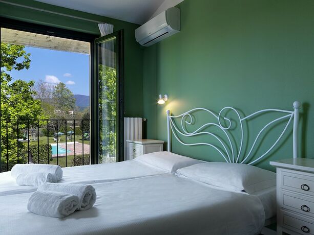 Imagen de la habitación del Casa per Ferie Garda Il Melograno. Foto 19