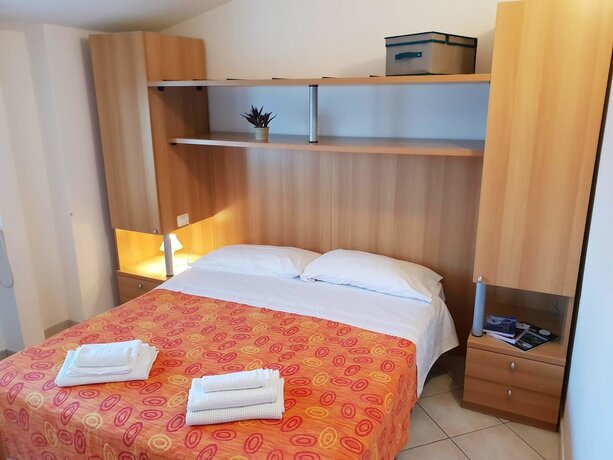 Imagen de la habitación del Casa-Albergo Tiroasegno. Foto 16