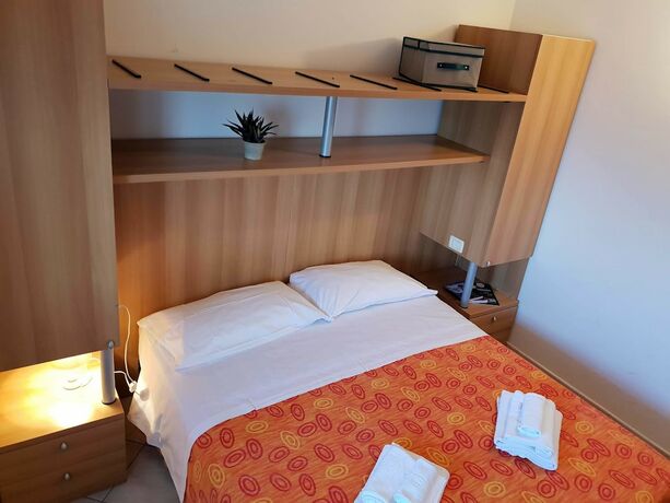 Imagen de la habitación del Casa-Albergo Tiroasegno. Foto 17